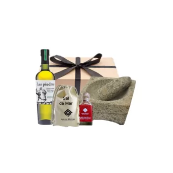 Mortero de piedra de cantera con saquito de sal de mar y merken y aceite de oliva
